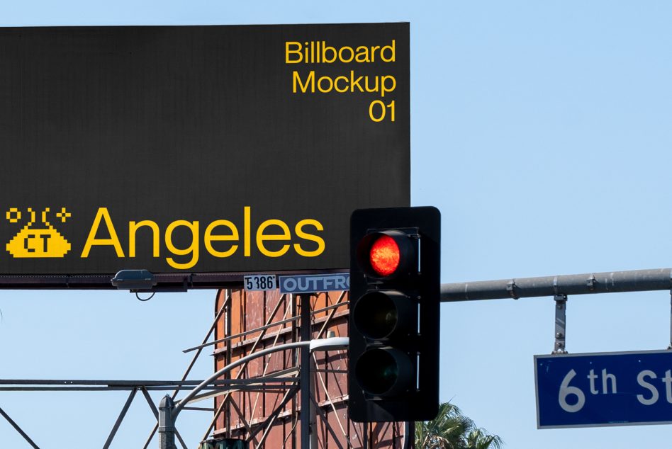 Urban billboard mockup on a sunny day with a clear sky and traffic light, perfect for advertising presentations.